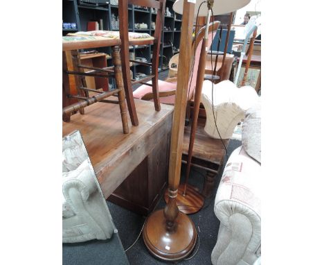 A mid 20th century mahogany standard lamp