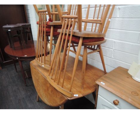 A Ercol style kitchen table and 4 chairs