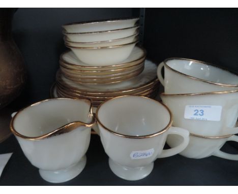 A modern gilded tea service