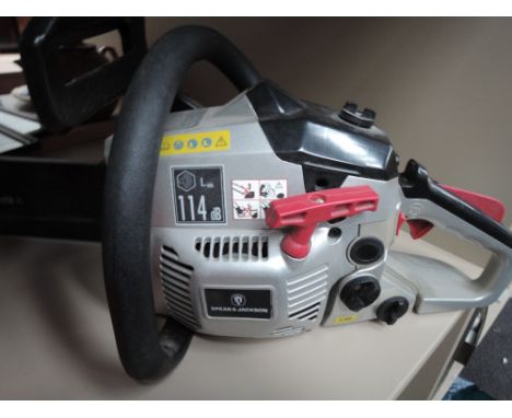 A spear and Jackson garden chainsaw with attachments
