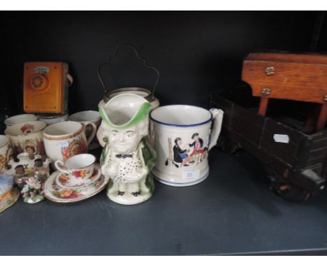 A misc shelf of ceramics and treen including coronation wear and Victorian frog mug