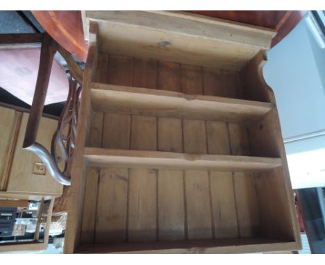 A pine wall shelf