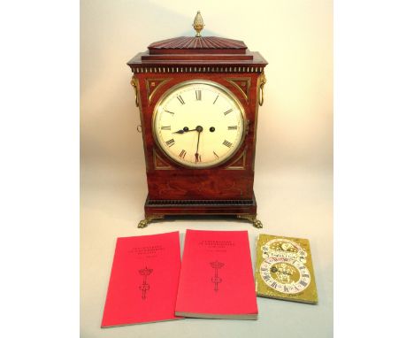 REGENCY MANTEL CLOCK WITH CREAM ENAMELLED CIRCULAR DIAL ENCLOSING AN EIGHT DAY MOVEMENT STRIKING ON A BELL, IN A BRASS INLAID