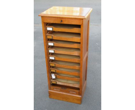 EARLY 20th CENTURY OAK PEDESTAL FILING CABINET WITH A TAMBOUR DOOR ENCLOSING NINE DRAWERS (H: 109cm)