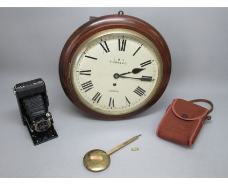 LMS WALL TIMEPIECE WITH A CIRCULAR DIAL INSCRIBED "L.M.S. R JONES &amp; Co., LONDON" AND BLACK ROMAN NUMERALS, ENCLOSING AN E
