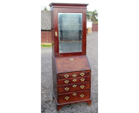 18th CENTURY MAHOGANY BUREAU BOOKCASE OF SMALL PROPORTIONS WITH A MOULDED CORNICE, MIRRORED DOOR ABOVE ENCLOSING THREE ADJUST