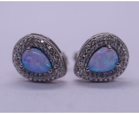 Pair of opal &amp; stone set silver earrings 
