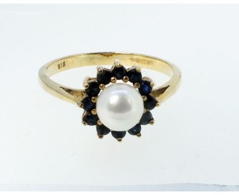 A 9 carat gold pearl and sapphire cluster ring, size O, 2g 