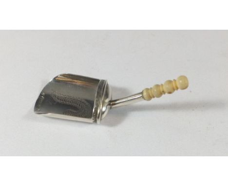 A silver caddy spoon with turned bone handle, Birmingham 1805 by Cocks &amp; Bettridge 