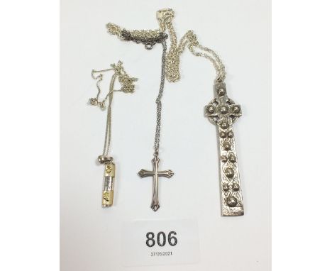A Scottish Silver Celtic cross pendant on chain, together with a silver cross and a Chinese mother of pearl and silver pendan