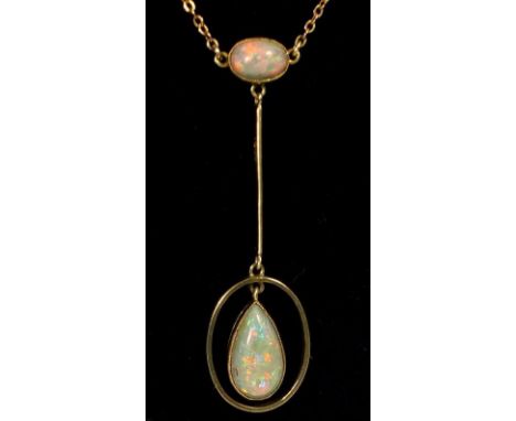 A 14 carat gold Edwardian Art Nouveau pendant set opal and opal drop 