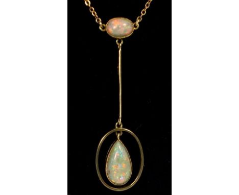 A 14 carat gold Edwardian Art Nouveau pendant set opal and opal drop 