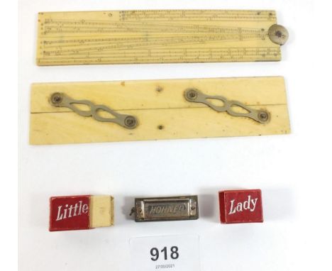 Two ivory drawing rulers and a 'Little Lady' miniature Hohner harmonica, boxed 