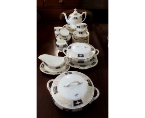 A Coalport "Palladian" dinner and tea service comprising: six cups and saucers, six dinner plates, twelve salad plates, five 