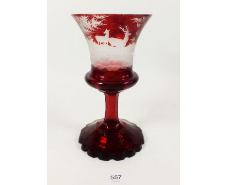 A 19th century ruby glass large goblet with etched stag decoration, small chips, 22cm 