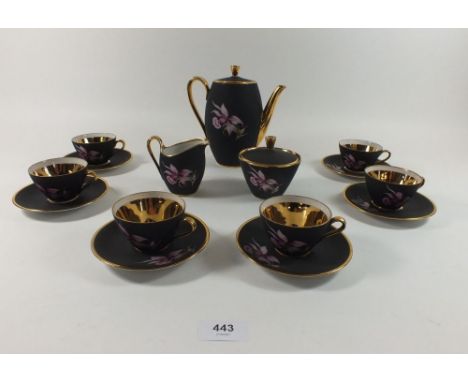 A vintage Bavarian coffee set "Zelda" with orchid decoration on matt black ground comprising six cups six saucers coffee pot 