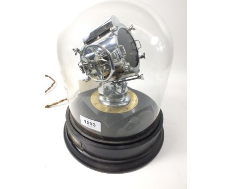 A scale model of an anti aircraft search light, by C Sheffield, under glass dome, 60cm tall