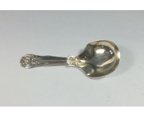 A silver caddy spoon, Birmingham 1847 by George Unite, engraved Julia to reverse 