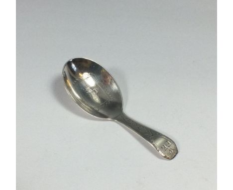 A silver engraved caddy spoon, London 1789 by Ann &amp; George Burrows 