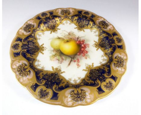 A Royal Worcester plate painted apples and berries in rich gilt and blue border, A/F 