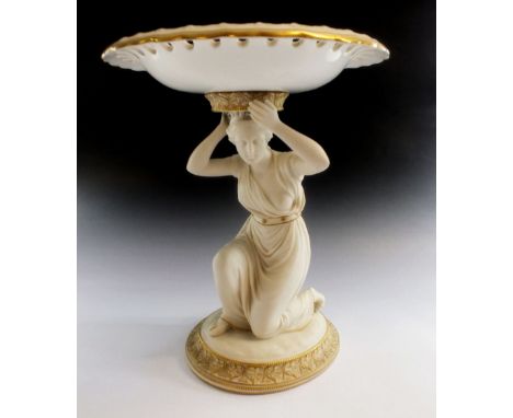 A Worcester style porcelain comport with kneeling woman to stem, 27cm