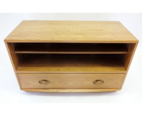 An Ercol Golden Dawn Minerva television cabinet with drawer to base, 91cm wide x 43cm deep x 56cm tall