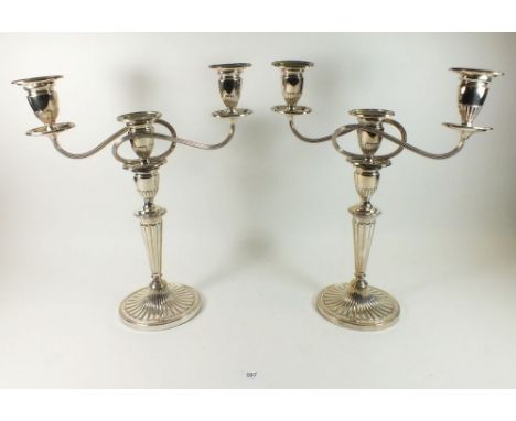 A pair of large silver plated three branch candelabra 