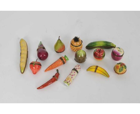 A collection of Staffordshire and Limoges novelty enamel boxes in the form of various fruits and vegetables - including a pea