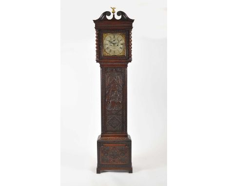 An 18th century oak longcase clock, later carved with a figure of Chronos, foliate bands and flowers, the hood with a broken 