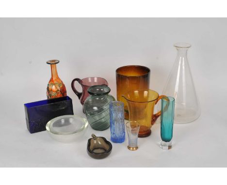 A large quantity of table and decorative glassware, including a desk lamp with orange glass shade, soda siphon, 1950s glass r