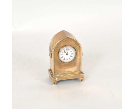 An Edwardian silver mounted timepiece, Deakin &amp; Francis, Birmingham 1902, of arched form with two loop handles, the white