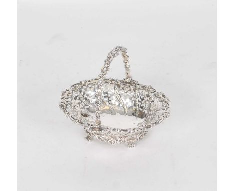 A George III silver sweetmeats basket, Samuel Herbert &amp; Co, London 1762, of oval pierced form with decorative pierced swi
