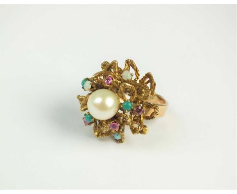 A cultured pearl set dress ring, designed a single central cultured pearl set to textured stylised petal mount set with synth