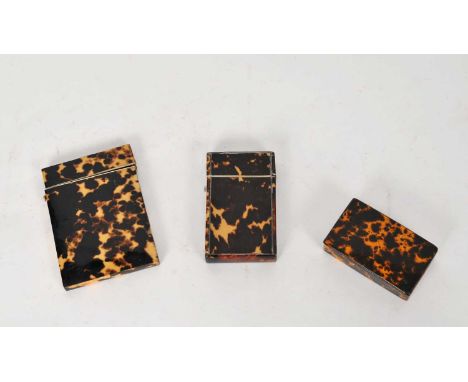 Two tortoiseshell card cases, together with a tortoiseshell effect papier mache snuff box (3)