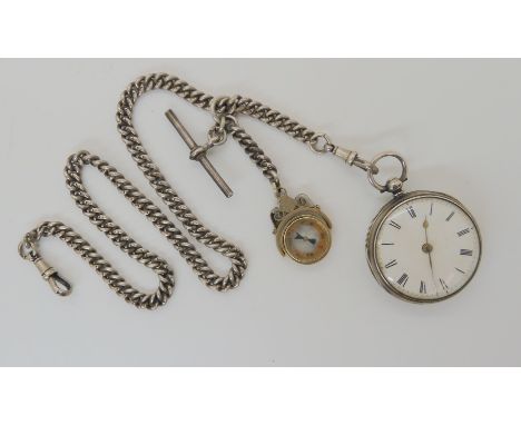 A silver fob watch circa 1874, with silver fob chain hallmarked to every link, with attached  compass Condition Report: Not a