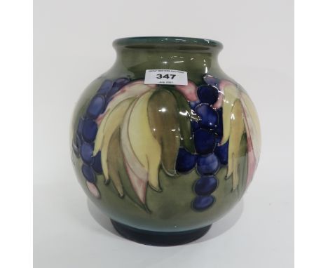 A Moorcroft leaves and berries pattern bulbous vase, with impressed and painted signature to base Condition Report: Light cra