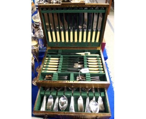 A ninety piece EP & bone handled cutlery set (missing knife sharpener) in Art Deco oak canteen Condition Report: There are 12