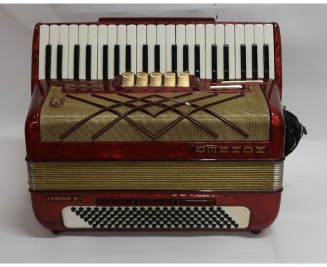 A Hohner Virtuola III accordion in black, 41 keys and 120 bass buttons together with a soft carry case Condition Report: Avai