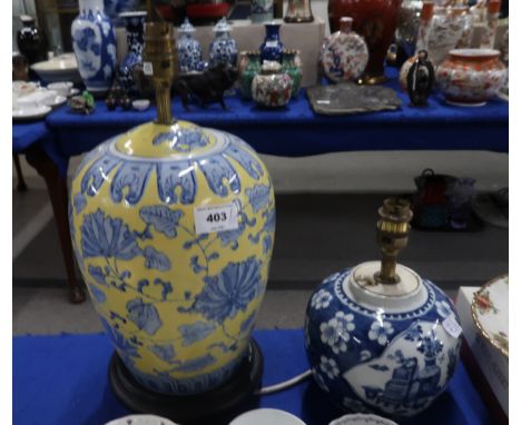 A Chinese blue and white ginger jar mounted as a table lamp, and another Chinese lamp Condition Report: Available upon reques