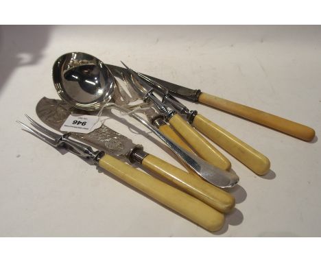 A lot comprising a silver soup ladle Sheffield 1940, fish servers, carving set etc. Condition Report: Available upon request