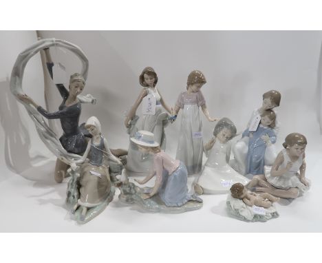 A collection of Nao figures including a dancing girl with a ribbon, mother and child, baby etc and two Lladro figures Conditi