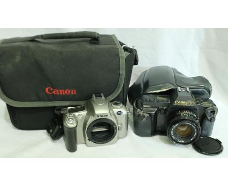 Canon T70 camera with Canon FD 50mm 1:18 lens and a Nikon F55 camera body. P&amp;P Group 2 (£18+VAT for the first lot and £3+