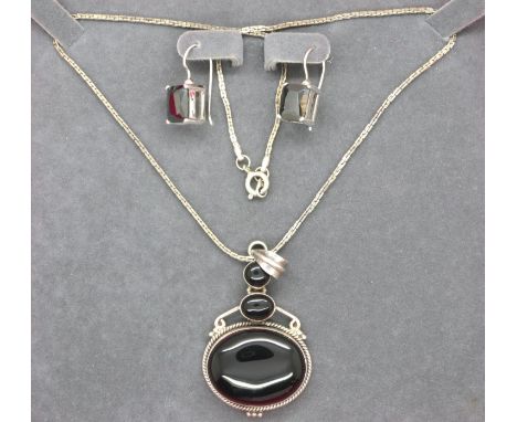 Boxed 925 silver black stone set necklace and earring set, combined 22g. P&amp;P Group 1 (£14+VAT for the first lot and £1+VA