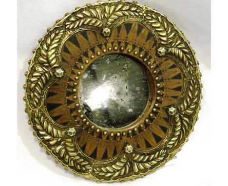 Wood with brass relief detailing, small circular mirror D: 20 cm. P&amp;P Group 2 (£18+VAT for the first lot and £3+VAT for s