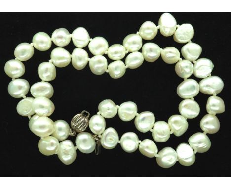 Boxed single strand of freshwater pearls, with silver clasp, L: 22 cm. P&amp;P Group 1 (£14+VAT for the first lot and £1+VAT 