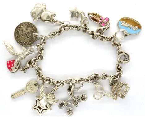 925 silver charm bracelet with twelve charms, L: 17 cm, combined 28g. P&amp;P Group 1 (£14+VAT for the first lot and £1+VAT f