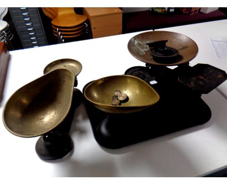 Three sets of antique kitchen scales with weights 