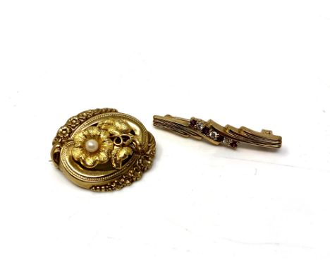 A 9ct gold ruby bar brooch together with a further 9ct gold brooch set with a pearl (2)