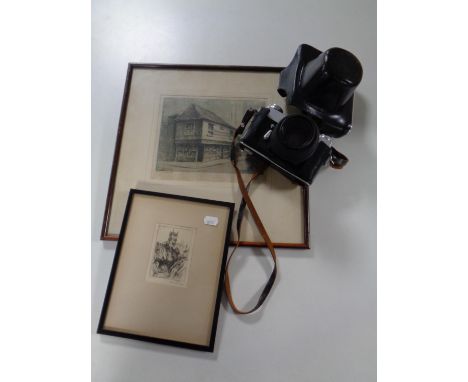 A Zenit-B camera in leather case together with two signed black and white etching to include The Old Curiosity Shop 
