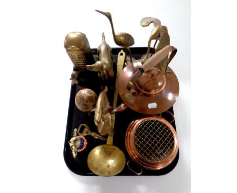 A tray containing assorted brass ornaments, telephone money box, ladle, copper kettle etc 